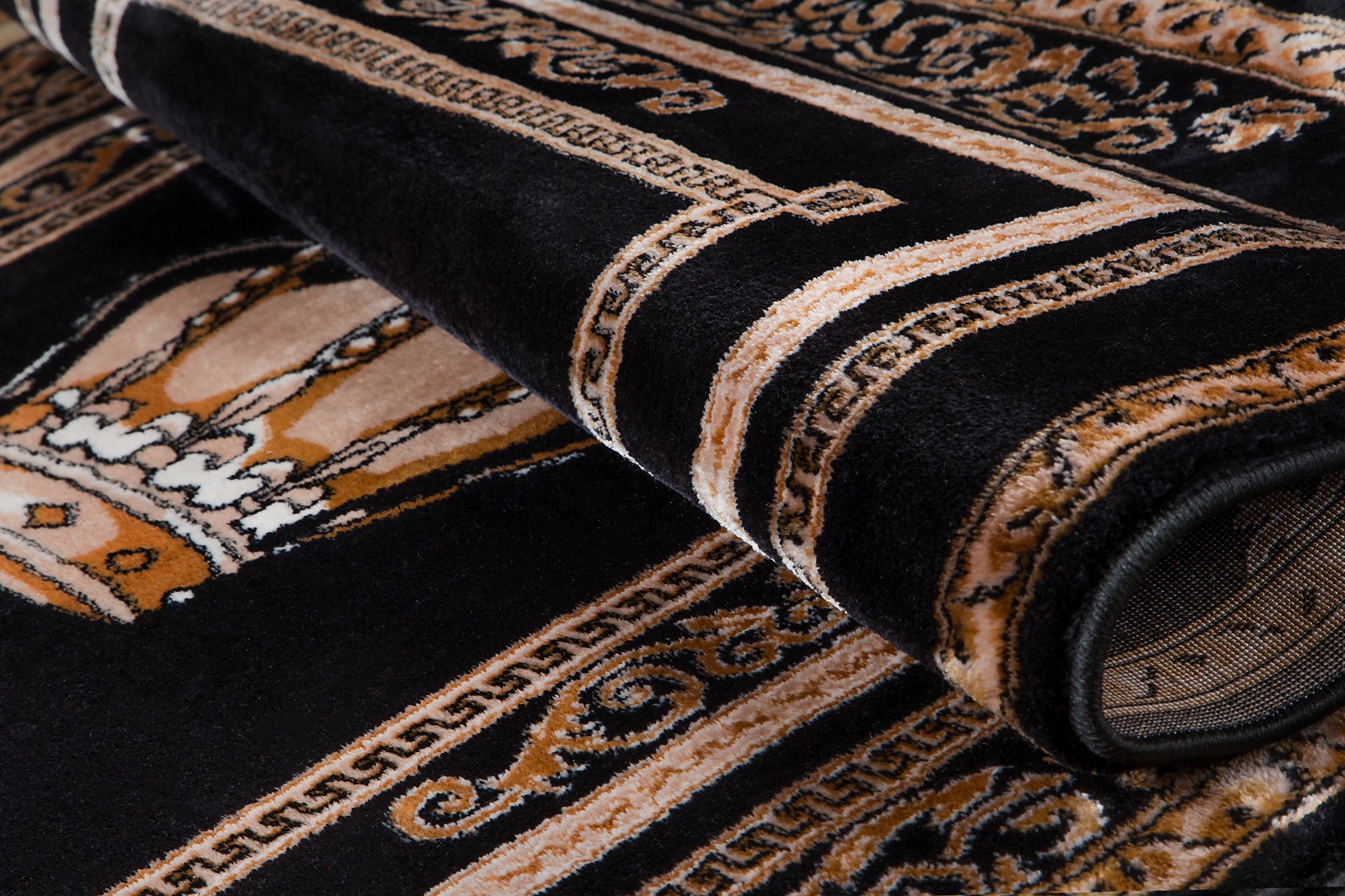 Wohnzimmerteppich in Schwarz Gold mit edlem Kronenmotiv im Italienischen Design - rutschfest & langlebig